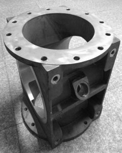 SMI changeover valve body large format cast iron dual flange construction — precision machined ports and faces to customer drawing