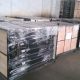 SMI PTO shaft and driveline components complete export consignment — wooden cases with plastic wrapping, labelled for international shipping