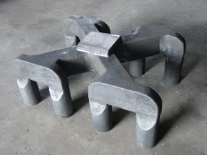 Cast steel anode yoke eight-claw single unit three-quarter view showing full claw arrangement cylindrical claw end nodes and central connection block — low carbon steel Q235 rare earth refined for high-amperage electrolytic aluminium cells