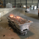 Hot aluminium dross and salt slag in skim pan immediately after skimming — casthouse service conditions for SMI casthouse consumables